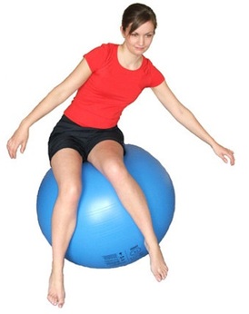Girl balancing on an exercise ball